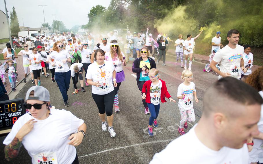 Runners take off from the starting line during the annual Color Run at Ramstein Air Base, Germany, on Saturday, Aug. 12, 2017. Nearly 400 people participated in the run.

