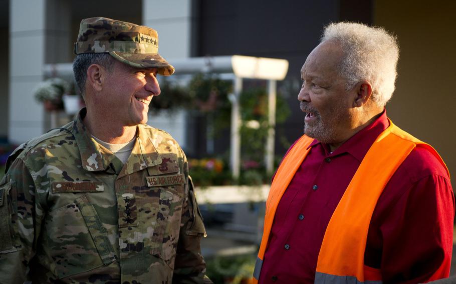 Air Force Chief of Staff Gen. David Goldfein, left, and Charlie Searchwell joke together at Ramstein Air Base, Germany, on Monday, Aug. 21, 2017.