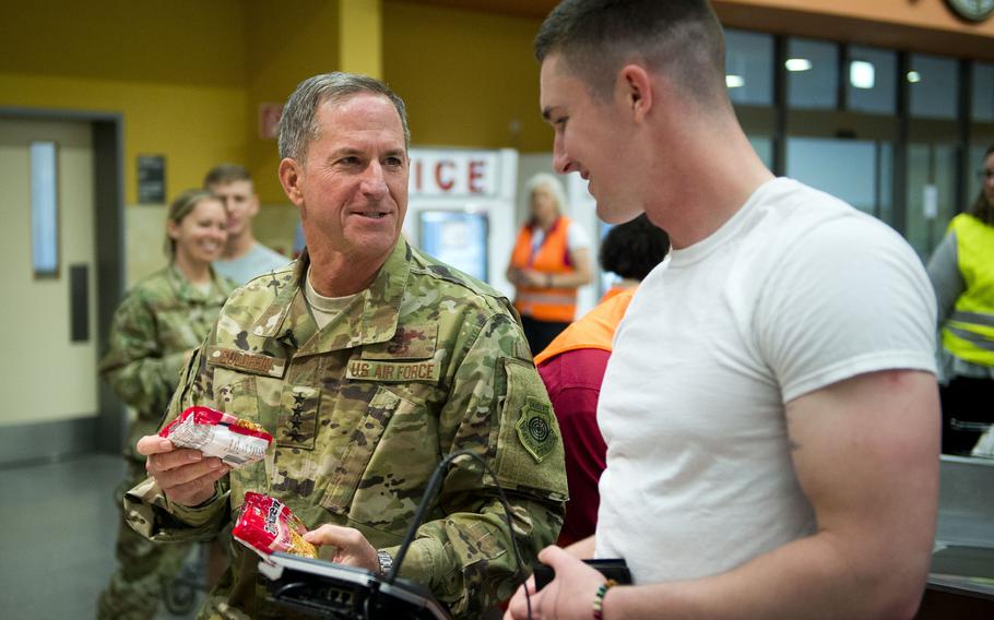 Air Force Chief of Staff Gen. David Goldfein, left, jokes with Pfc. Mitchell Trotter's grocery selection at Ramstein Air Base, Germany, on Monday, Aug. 21, 2017. Mitchell works in preventive medicine at the Landstuhl Regional Medical Center.


