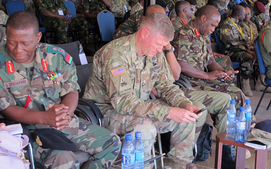 Maj. Gen. Joseph Harrington, commander of U.S. Army Africa, center, at a peacekeeping demonstration at the African Land Forces Summit in Lilongwe, Malawi, on May 9, 2017. Harrington was suspended Friday pending an investigation into flirtatious text messages he is suspected of sending to another man’s wife.