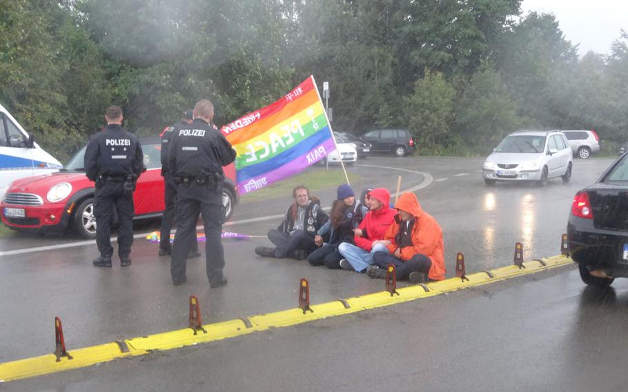 Protesters at Ramstein Air Base in Germany block traffic during demonstrations Saturday against operations at the base on Sept. 9, 2017.