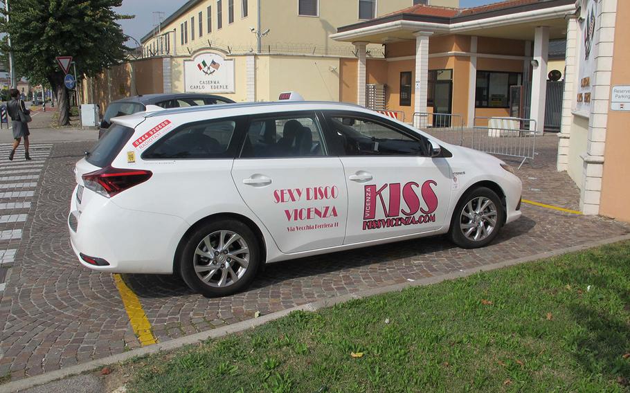 A taxi waits outside one of Caserma Ederle's gates in Vicenza, Italy on Wednesday, Oct. 4, 2017.