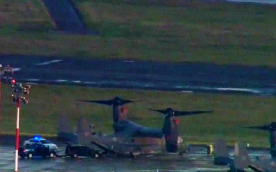 A BBC video shows an aerial view of a black car near a V-22 Osprey at Mildenhall, England, on Monday.