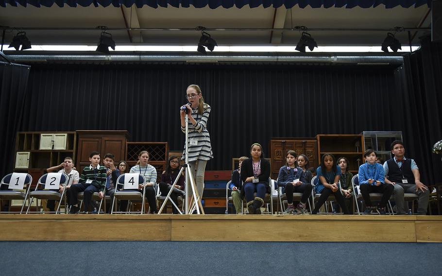 Asenath Wetzel of Vicenza Middle School, Italy, spells a word during the early rounds of the 35th Annual European PTA Spelling Bee on Saturday, March 10, 2018. Twenty-seven students from DODEA schools in Europe participated. The contest was held at Ramstein Elementary School in Germany.
