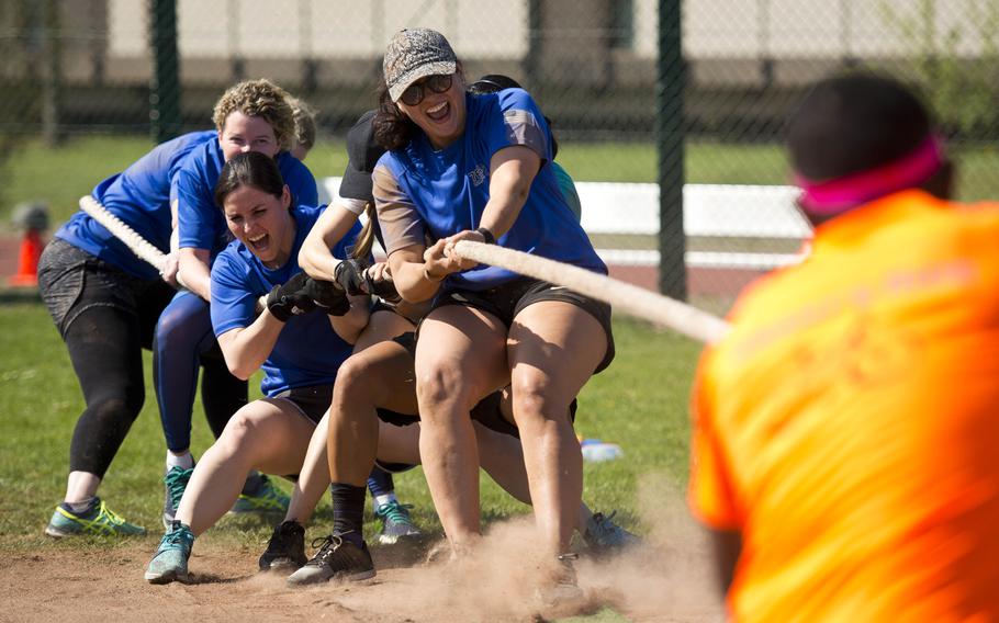 When Doves Fly, a 76th Airlift Squadron team, battles a fellow squadron team, Not Our First Rodeo, during a tug-of-war match at Ramstein Air Base, Germany, on Friday, April 20, 2018.