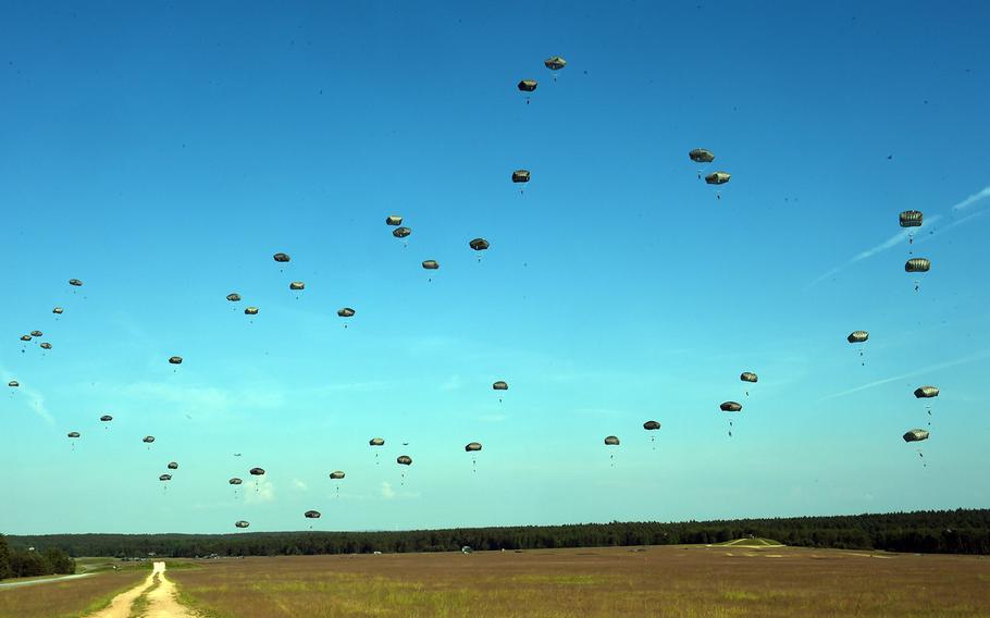 Paratroopers with the 173rd Brigade Combat Team (Airborne) drop down to an artillery live-fire exercise at Grafenwoehr, Germany, Friday, May 18, 2018. 