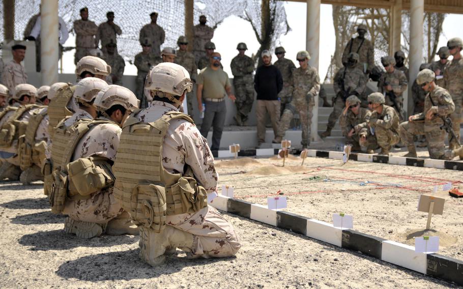 U.S. soldiers receive a mission brief before conducting a combined-arms live-fire event at Iron Union 5 in the United Arab Emirates on Sept. 25, 2017. Afghanistan announced on Tuesday, June 5, 2018, that it had approved an offer by the UAE to provide troops to NATO's Resolute Support mission.