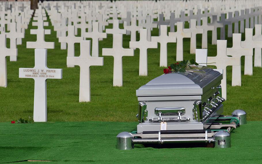 The coffin of Julius “Henry” Pieper sits at Normandy American Cemetery in Colleville-sur-Mer, France, next to the grave of his twin brother, Ludwig J. W. ''Louie'' Pieper. 