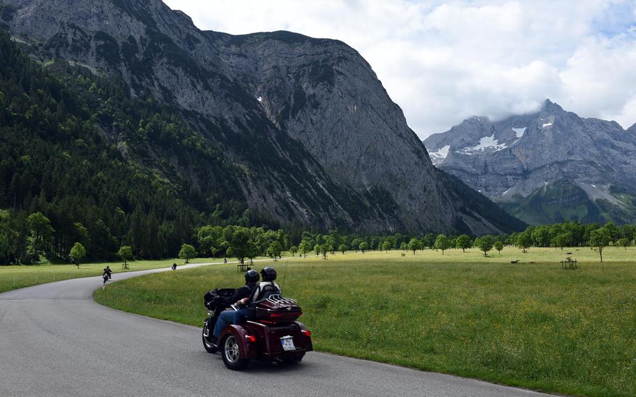 Bikers at the Ride the Alps event, driving through an Alpine valley, Near Eng, Austria, Saturday, June 23, 2018. 