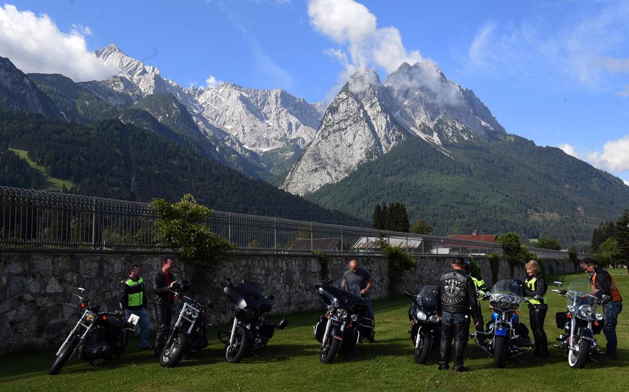 Bikers at the Ride the Alps event, get ready to ride their motorcycles at Garmisch, Germany, Saturday, June 23, 2018. 