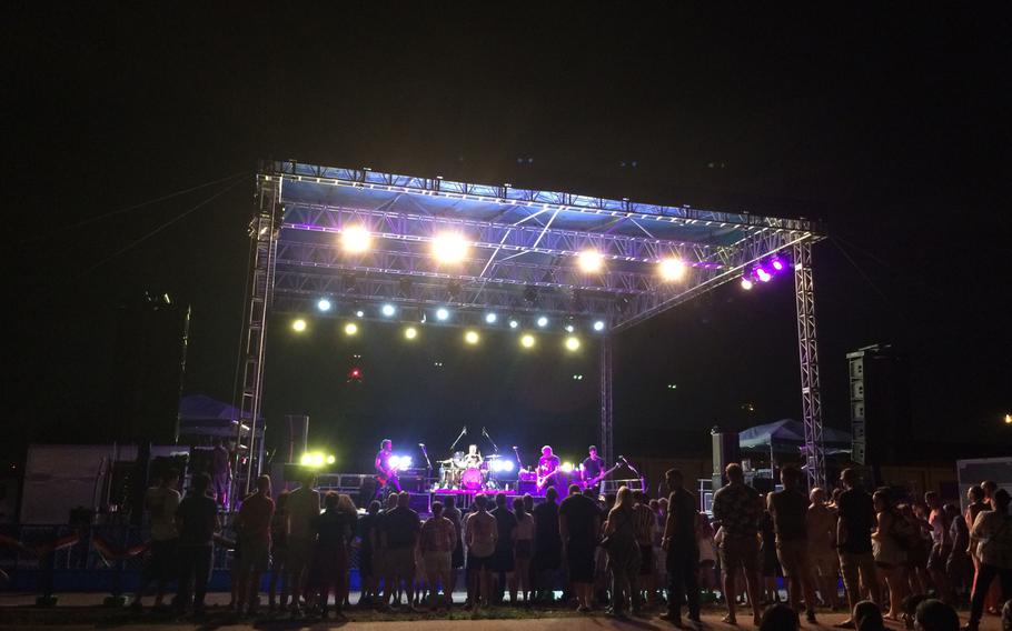 The rock band Fuel entertains troops and their families celebrating Independence Day with fireworks at Yokota Air Base, Japan, on Tuesday,  July 3, 2018.