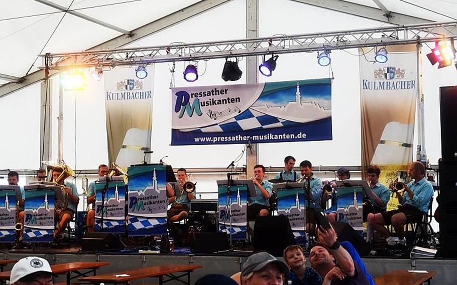 A German brass band plays at the German-American Volksfest at Grafenwoehr, Germany, Friday, Aug. 3, 2018. 