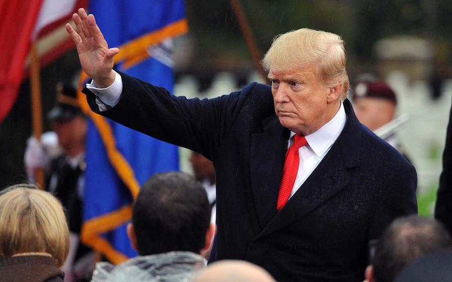 President Donald Trump waves to the spectators after speaking at the World War I armistice centennial ceremony, at Suresnes American Cemetery on the outskirts of Paris, Sunday, Nov. 11, 2018. 


