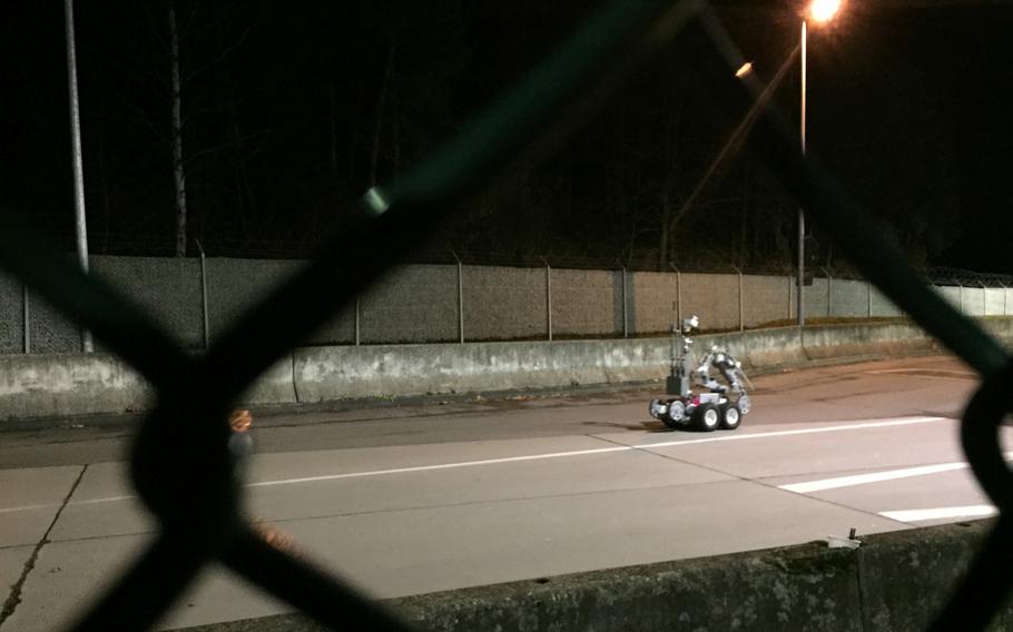 A remotely operated bomb disposal robot prepares to inspect a vehicle driven by a retiree who purportedly made reference to a bomb in his car at Kleber Kaserne, Germany. According to base officials, the 83-year-old Army veteran refused to let security guards do a random search of his vehicle and then made a threat.


