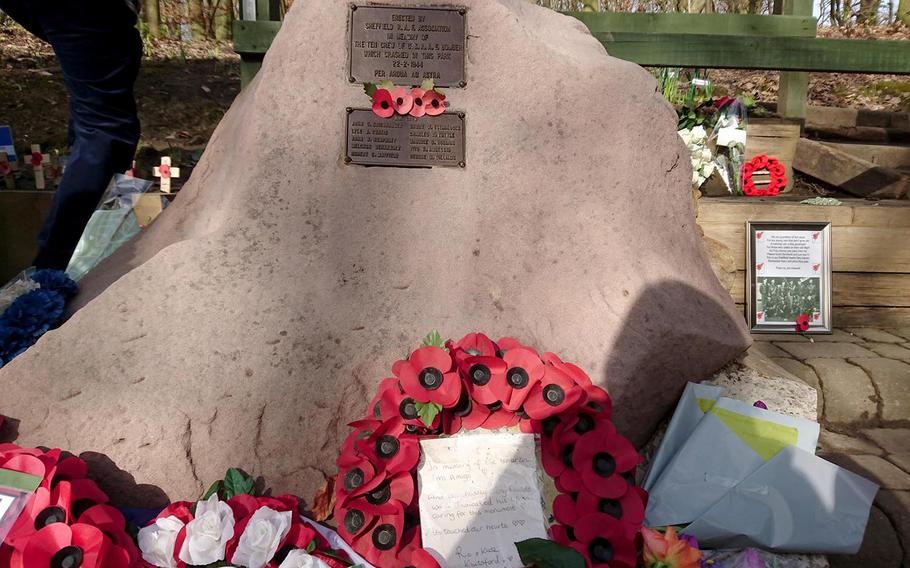 A memorial to airmen killed in a B-17G Flying Fortress that crashed 75 years in  Endcliffe Park in Sheffield, England, Friday, Feb. 22, 2019. The memorial was built in 1969 with 10 American Oaks planted at the site.