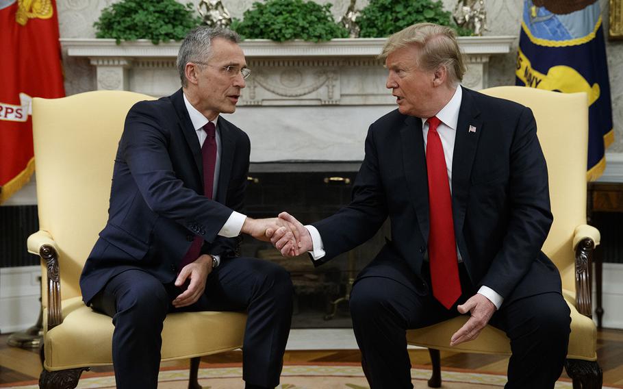 President Donald Trump shakes hands with with NATO Secretary General Jens Stoltenberg during a meeting in the Oval Office of the White House, Tuesday, April 2, 2019, in Washington. 