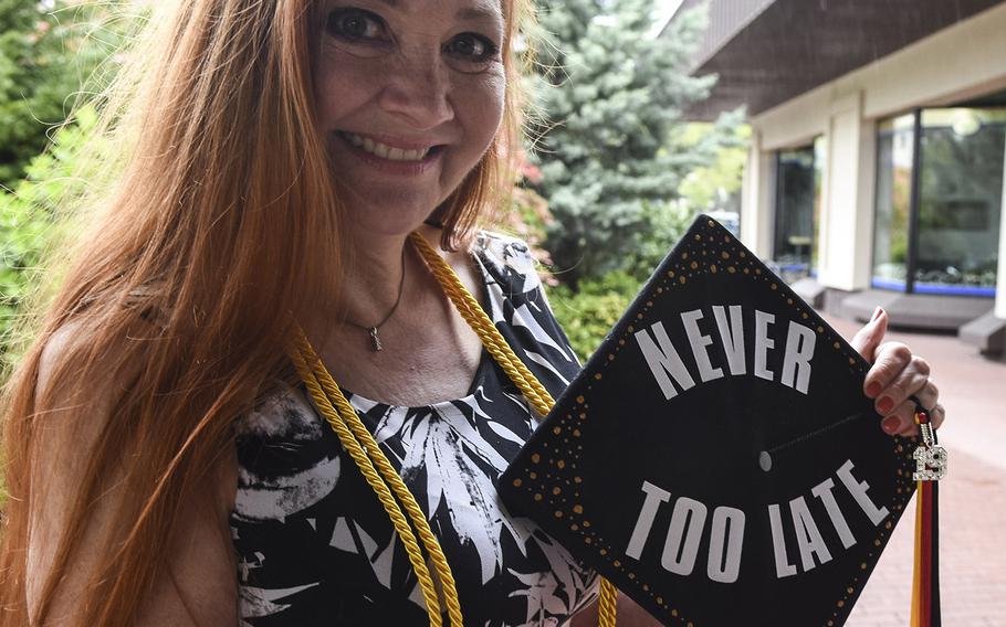 Nicole Sewell displays the motto towards education on her graduation cap at the UMUC Europe commencement on Saturday, May 4, 2019, at Ramstein Air Base, Germany. Sewell received a bachelor's degree in literature and earned the highest GPA of all undergraduates.