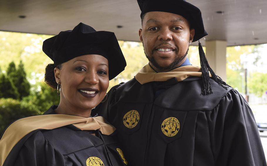 Tashondra Hicks and Senior Airman Damian Hicks received an MBA at the UMUC Europe commencement ceremony on Saturday, May 4, 2019, at Ramstein Air Base, Germany. The couple juggled raising two toddlers, a pregnancy and a deployment in earning their MBA in 18 months while Damian was assigned to RAF Lakenheath, U.K.