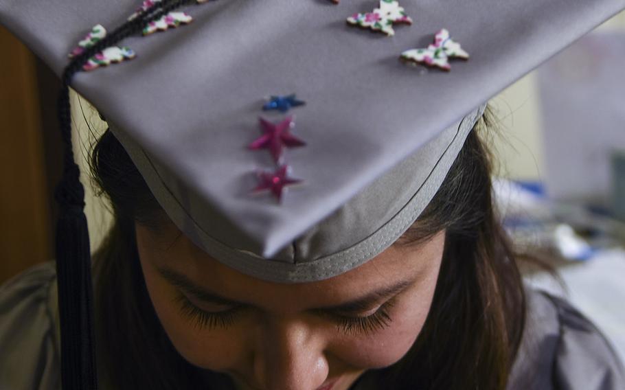 Jessica Cartagena, 22, decorated her graduation hat with butterflies and stars, since "this is my time to shine," she said. An Army spouse from Baumholder, Cartagena received her associate's degree in psychology at the UMUC Europe commencement on Saturday, May 4, 2019, at Ramstein Air Base, Germany.