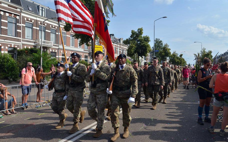 The U.S. contingent marches toward the finish line of the Nijmegen Four Days Marches behind a U.S. Army Europe color guard, Friday, July 19, 2019.







