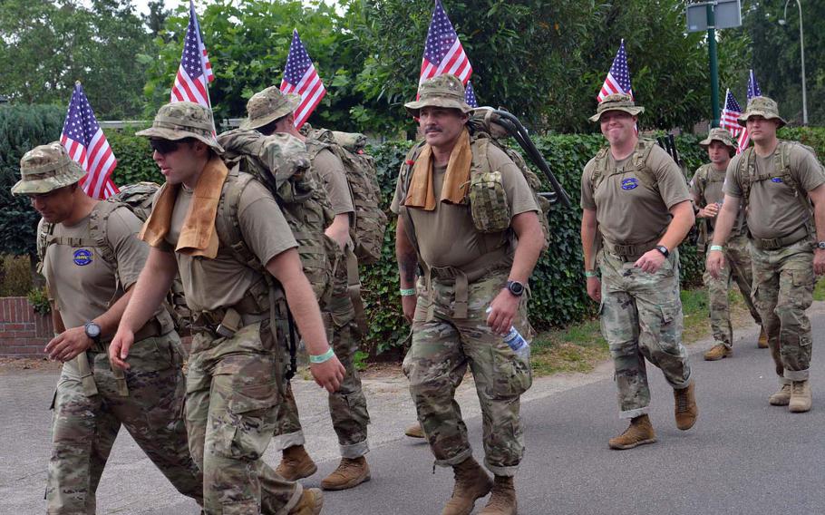 Marchers from the Joint Multinational Readiness Center in Hohenfels, Germany, march out of a rest area in Gassel, Netherlands, on the final day of the Nijmegen Four Days Marches, Friday, July 19, 2019.
