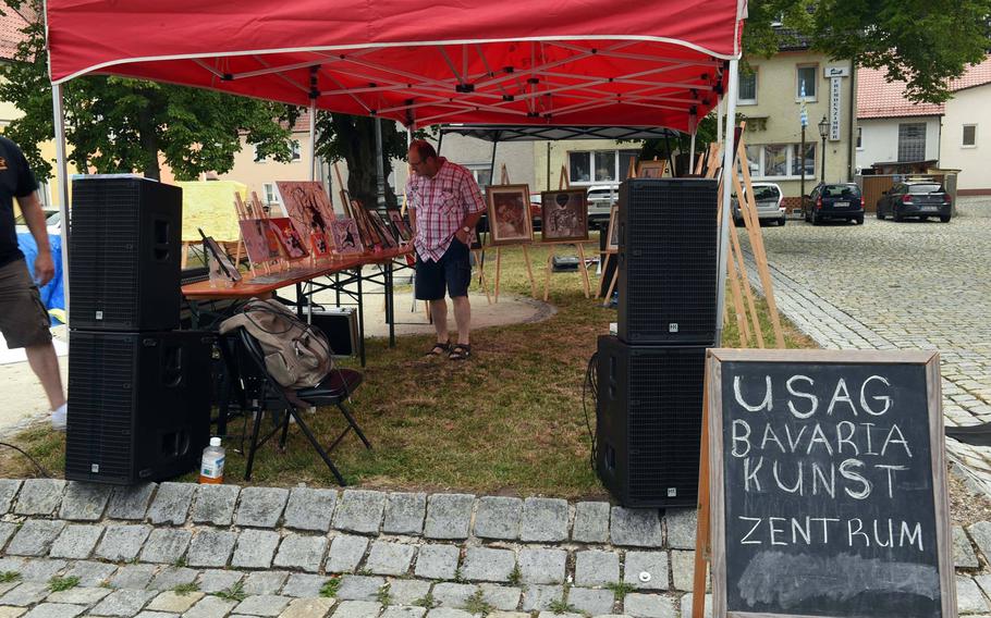Works of art made by U.S. Army Garrison Bavaria personnel, on display at the traditional market in Grafenwoehr, Germany, Sunday, July 28, 2019. 
