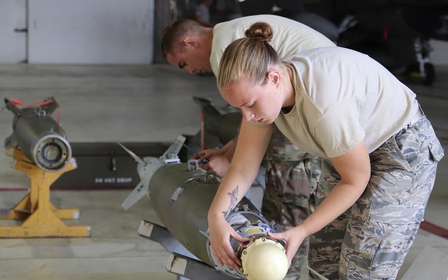 Airman 1st Class Kiara Beyer, a weapons load crew member assigned to the 31st Aircraft Maintenance Squadron and Staff Sgt. Brady Trombley, a weapons load crew chief, assigned to the same unit, prepare a 500-pound GBU-38 bomb for loading onto an F-16 Fighting Falcon during the Combat Ammunition Production Exercise, Aug. 8, 2019, at Aviano Air Base, Italy.

