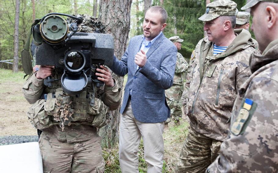 A soldier demonstrates how to use the Javelin anti-tank missile system to a delegation of senior Ukrainian military  officials at the Hohenfels Training Area, Germany in 2017. Seven Democratic Senators sent a letter Wednesday to DOD’s Inspector General, seeking a review into the role the Pentagon played in delaying funds for Ukraine that were intended to help it in a nearly six-year-old fight against Russian-backed separatistst.  

