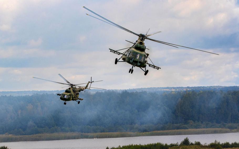 Ukrainian helicopters provide aerial support during a wet gap crossing demonstration as part of Rapid Trident 2019, Sept. 20, 2019, near Yavoriv, Ukraine.

