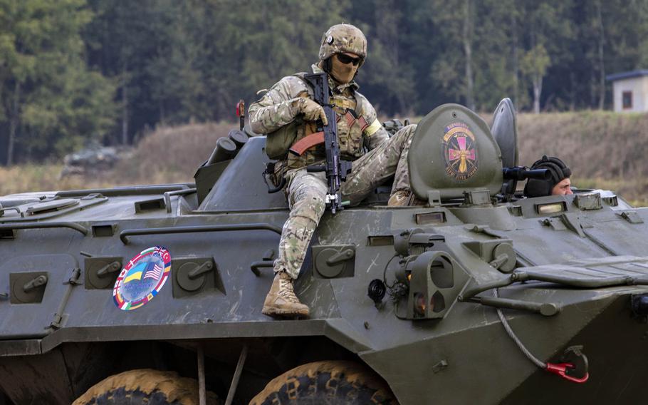 A Ukrainian soldier prepares for a fire team movement and room-clearing demonstration as part of Rapid Trident 2019, Sept. 20, 2019, near Yavoriv, Ukraine. 

