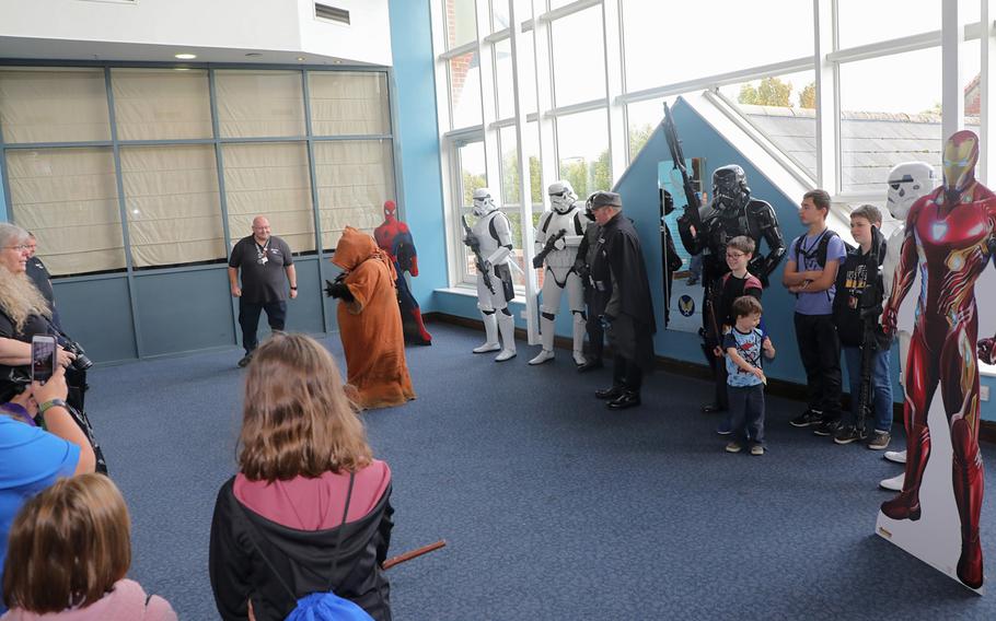 Children and adults pose with the 501st Garrison — UK during the first Mil-D-Con on RAF Mildenhall on Saturday, Oct. 5, 2019.