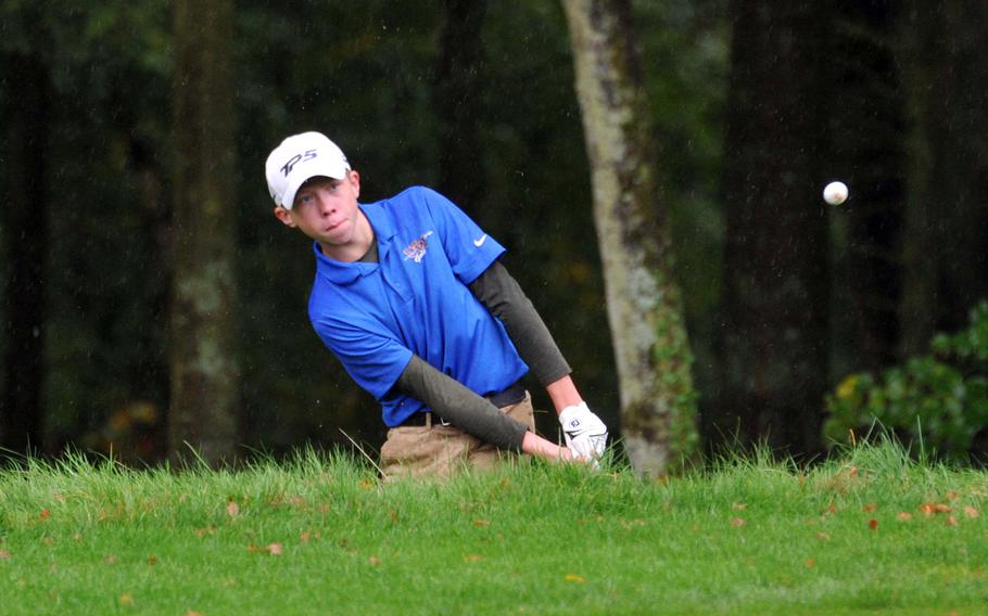 Wiesbaden's Clayton Shenk chips on to the green in opening day action at the DODEA-Europe high school golf championships in Wiesbaden, Germany, Oct. 9, 2019. Shenk took the lead with a modified Stableford score of 39 points going in to Thursday's final round.










