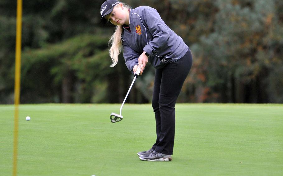 Vilseck's Anniston Fees watches her putt roll towards the hole in opening day action at the DODEA-Europe high school golf championships in Wiesbaden, Germany, Oct. 9, 2019. Fees scored a modified Stableford 19 points to lead going in to Thursday's final round.









