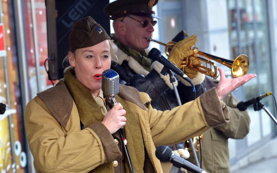 Band members dressed in World War II-era garb entertain with music from the era on the streets of Bastogne, Belgium, as the city and the surrounding areas mark the 75th anniversary of the Battle of the Bulge on Saturday, Dec. 14, 2019.








