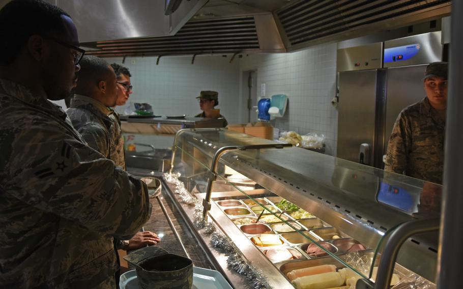 Airmen wait for a hot meal at the Rheinland Dining Facility at Ramstein Air Base, Germany, on Tuesday, Dec. 17, 2019. The 1950s-era dining facility will close for up to two years starting in mid-January for a major renovation project.

