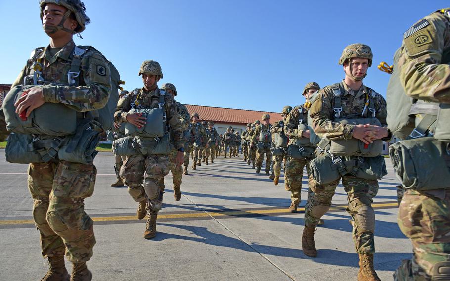 Paratroopers with the 173rd Airborne Brigade prepare to board a C-130 Hercules plane during an airborne exercise at a drop zone near Pordenone, Italy, Dec. 3, 2019. Soldiers with the 173rd are deploying to the Middle East, a brigade spokesman said Monday.

