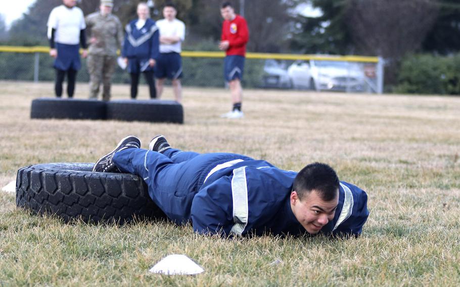 An airman with the 31st Fighter Wing, Aviano Air Base, Italy, performs push-ups during the Amazing Wyvern Race event on Friday, Jan. 31, 2020. The team that tackled various challenges in the fastest time won the event.

