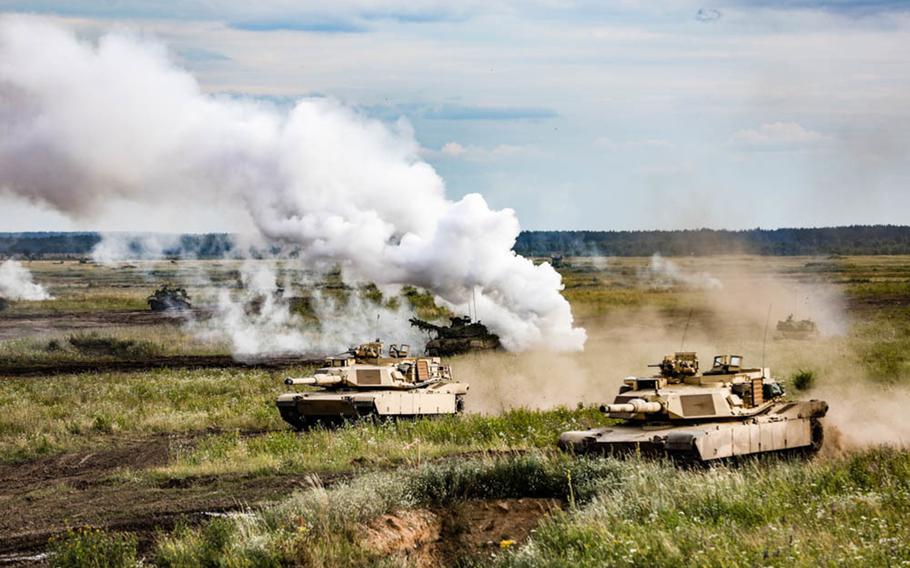 U.S. and Polish forces participate in a simulated tank battle  during the "Tank Battle" event held at  Bemowo Piskie Training Area, July 13.

Emily Dittmar/U.S. Army