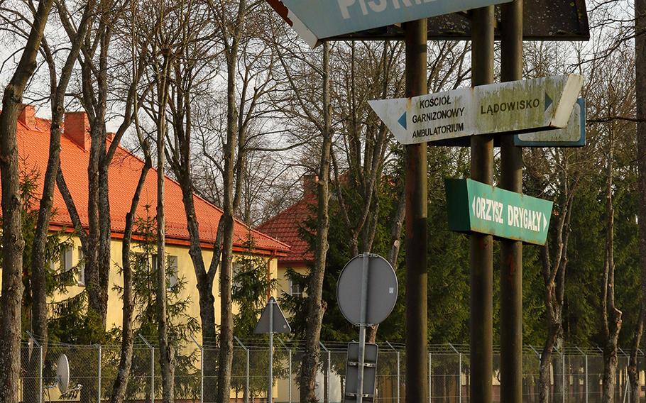 Signs welcome motorists to the village of Bemowo Piskie in Poland. When American troops first deployed to northeast Poland in 2017 to lead a NATO enhanced Forward Presence battle group, the population of the village of Bemowo Piskie grew by a third overnight.

Piotr Panufnik