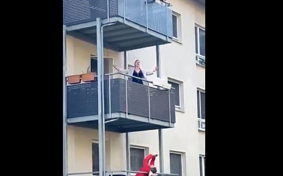 In this screen shot, Emily Cabana, a Marine spouse who lives at Patch Barracks in Stuttgart-Vaihingen, Germany, was filmed by neighbors Tuesday in a video that has drawn thousands of views on Facebook and been widely shared since. 

Facebook