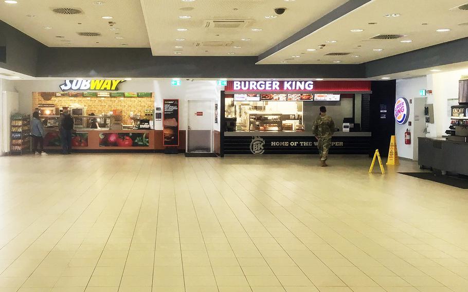 The food court at Patch Barracks in Stuttgart, Germany, is deserted on Wednesday, March 18, 2020. Coronavirus cases continue to climb in Stuttgart, which has the most infections of overseas bases. Recent tests show a loss of smell and taste to be a new indicator of possible infection.