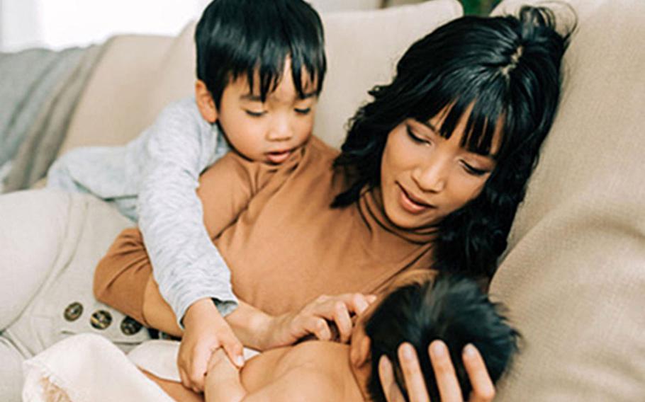 Deanna Sonza spends time with her kids in their home in Rothenstadt, Germany, in December. The Sonzas shipped out their household goods shortly before a 60-day stop-movement put moving to their next duty station on hold, but said they've received help from friends and neighbors.