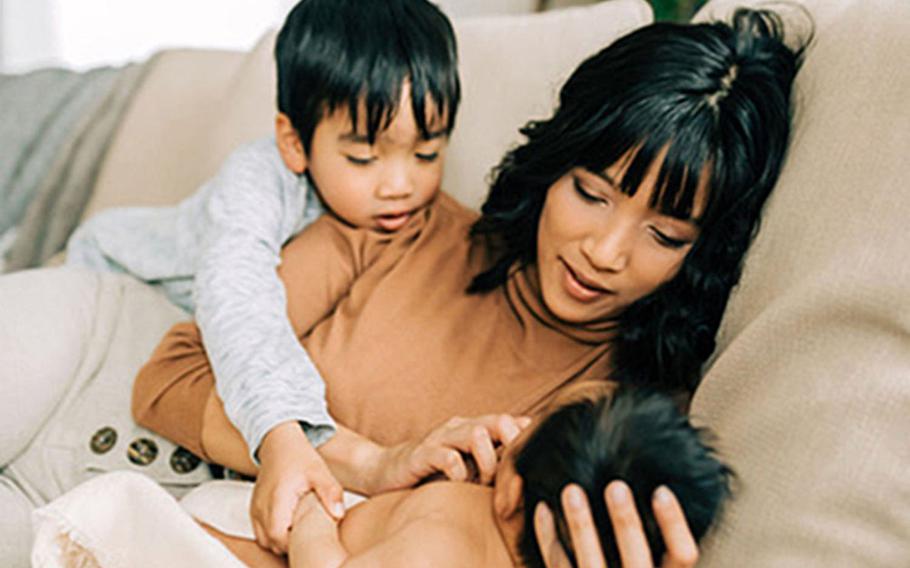 Deanna Sonza spends time with her kids in their home in Rothenstadt, Germany, in December. The Sonzas shipped out their household goods shortly before a 60-day stop-movement put moving to their next duty station on hold, but said they've received help from friends and neighbors.

