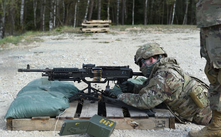 Pfc. Branden Schmidt, an intelligence analyst with the 41st Field Artillery Brigade, fires an M240B machine gun during an exercise at Grafenwoehr Training Area, April 17, 2020.
