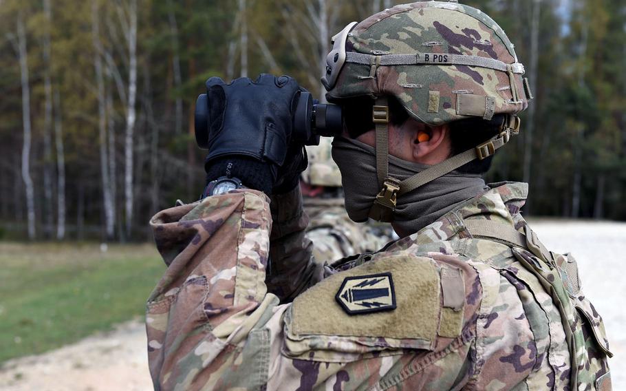 Spc. Luis Garcia, a wheeled vehicle mechanic with the 41st Field Artillery Brigade, observes an M240B machine gun's hits during an exercise at Grafenwoehr Training Area, Germany, April 17, 2020.
