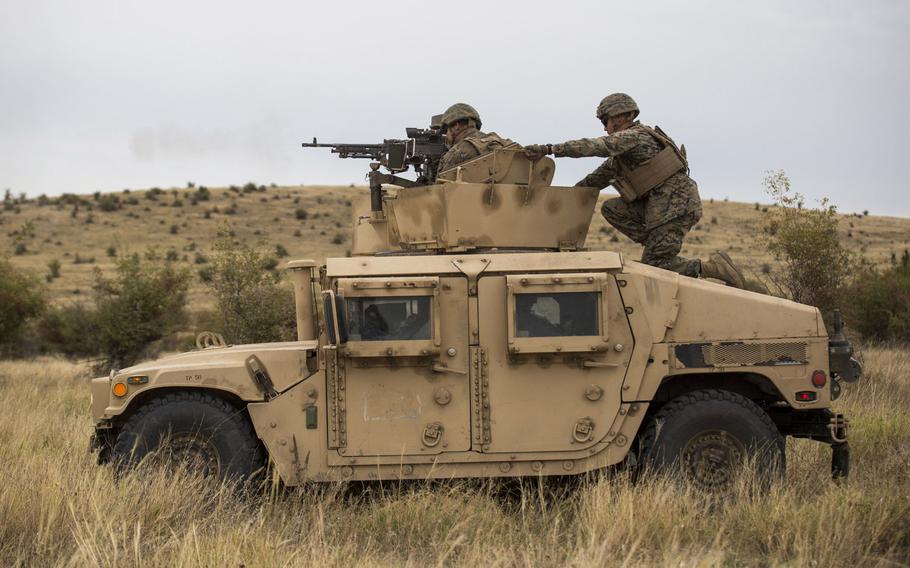 A U.S. Marine with Marine Rotational Force-Europe fires an M240B machine gun during an exercise in Romania in September 2019. A report co-authored by former U.S. Army Europe commander Ben Hodges and security analyst Janusz Bugajski, released on Tuesday, May 26, 2020, calls on NATO to make the Black Sea region its focus.

