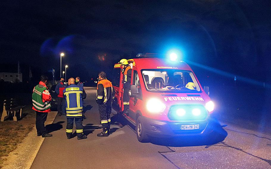 German emergency responders wait outside the Grafenwoehr training area after six Army paratroopers were badly injured during a training exercise. A local firefighter was also injured during the rescue.

