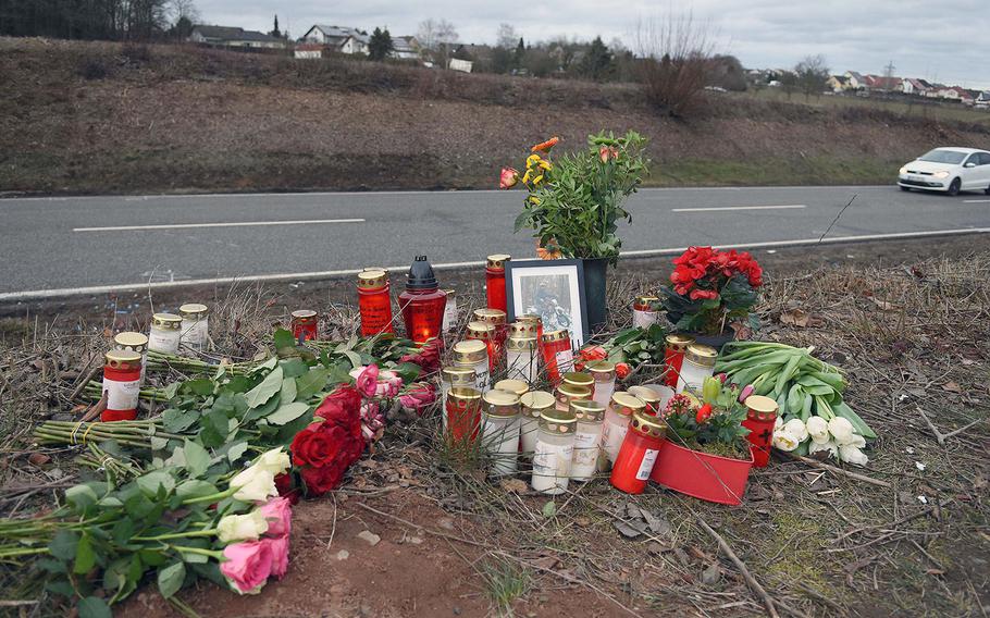 A roadside memorial of flowers and candles was created for a German teenager killed in a car crash with a Ramstein Air Base airman, near Weilerbach, Germany in February 2019.