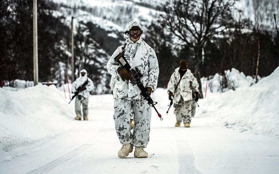 U.S. Marines conduct a foot patrol during cold-weather training at Bjerkvik, Norway, Feb. 23, 2020. Norwegian defense officials say the Marines are ending  rotations in the country but will continue to send troops there to train and practice periodically. 

