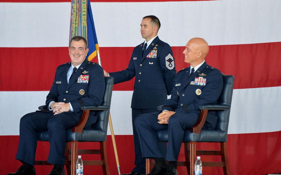 Outgoing 86th Airlift Wing commander Brig. Gen. Mark R. August, left, and incoming commander Brig. Gen. Joshua Olsen chuckle during a speech by 3rd Air Force commander Maj. Gen. Ronald Reed, at the 86th's change of command ceremony at Ramstein Air Base, Germany, Aug. 7. 2020. At center is Chief Master Sgt. Tommy Childers with the unit guidon.










